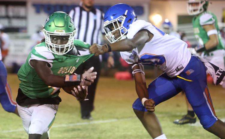 Suwannee running back Marquavious Owens escapes a tackle against Taylor County on Monday night. (PAUL BUCHANAN/Special to the Reporter)