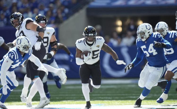 Jacksonville Jaguars running back James Robinson runs against the Indianapolis Colts on Oct. 16 in Indianapolis. (AJ MAST/Associated Press)