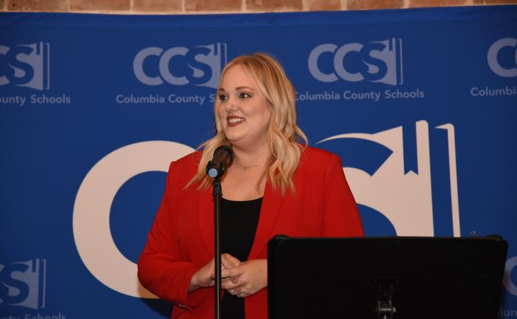 Dianna Swisher, the director of the Columbia County Public Schools Foundation, speaks at a previous year’s Teacher of the Year banquet. (FILE)
