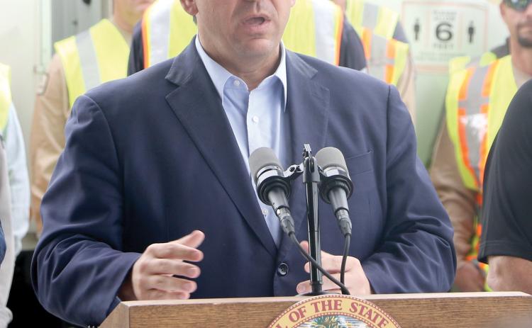 Gov. Ron DeSantis speaks during a visit to Lake City in September prior to Hurricane Ian. (FILE)