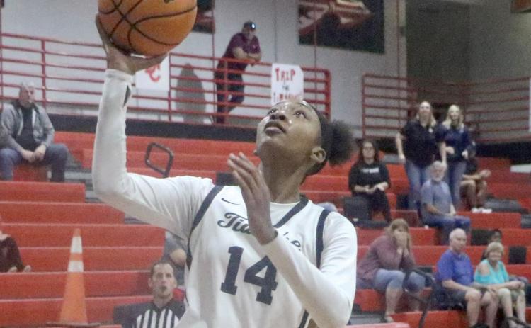 Fort White forward Isreal Hart shoots against Bradford in last season’s district championship. (FILE)