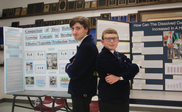 Fort White Middle School students Evan McKinney (left) and Cyler Robinson won FFA national titles for their work with hydroponics. McKinney teamed up with Marshall Bussey (not pictured) on his winning project. (TONY BRITT/Lake City Reporter)