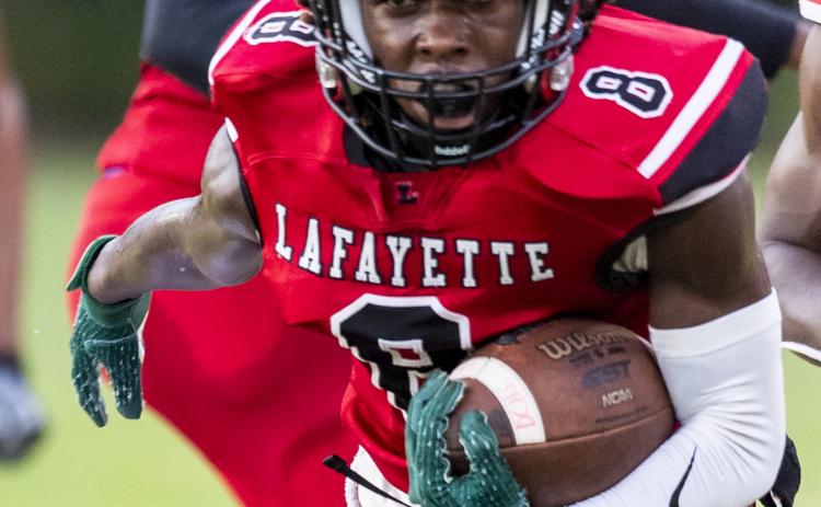 Lafayette running back JT Cook runs upfield in an earlier game this season. (FILE)
