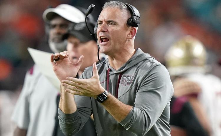Florida State head coach Mike Norvell watches from the sideline during a game against Miami on Nov. 5 in Miami Gardens. (LYNNE SLADKY/Associated Press)