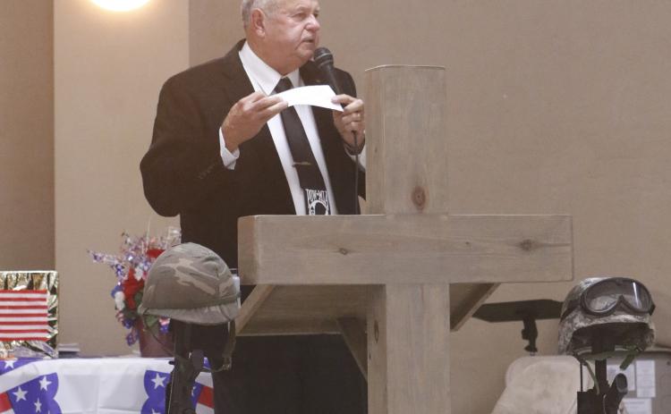 David Mangrum, a U.S. Army veteran, addressed patriotism with the hundreds that attended Saturday’s Veterans Day dinner at the Florida Gateway Fairgrounds. (JAMIE WACHTER/Lake City Reporter)