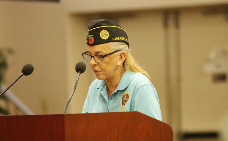 Rustyann Brown, a member of the American Legion Post 57, discusses the need for additional support for veterans from the county’s office Thursday. (JAMIE WACHTER/Lake City Reporter)