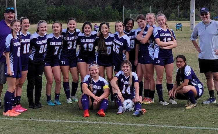 Columbia's girls soccer team: head coach Chip Garner (from left), Audrey Fender, Skyler Ziegaus, Haley Schraeder, Penelope Wheeldon, Sydney Rivas, Sally Sparks, Ashley Caballero, Caitlyn Tolley, Olivia Kelly, Sadie Sparks, Kyndall Norris, Lilly Schneider, Carla Medina-Rodriguez and Coach Raul Medina-Muniz. In front are Krystin Hughes and Mia Brasel. (COURTESY)