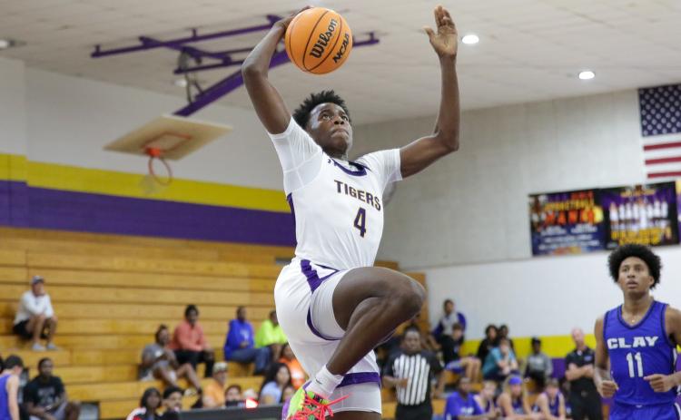 Columbia forward Ty'jahn Wright goes up for a dunk against Clay on Dec. 7. (BRENT KUYKENDALL/Lake City Reporter)