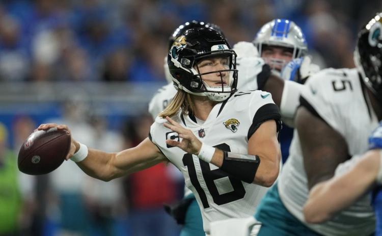 Jacksonville Jaguars quarterback Trevor Lawrence throws against the Detroit Lions on Dec. 4 in Detroit. (PAUL SANCYA/Associated Press)