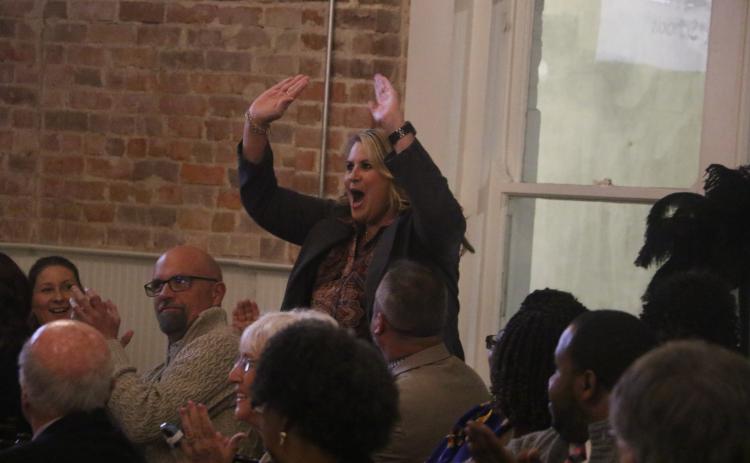 Richardson Sixth Grade Academy Principal Lisa Lee reacts after being named the Columbia County School District’s Principal of the Year during the ‘Excellence in Education’ banquet Thursday night at The Blanche Hotel. (MORGAN MCMULLEN/Lake City Reporter)