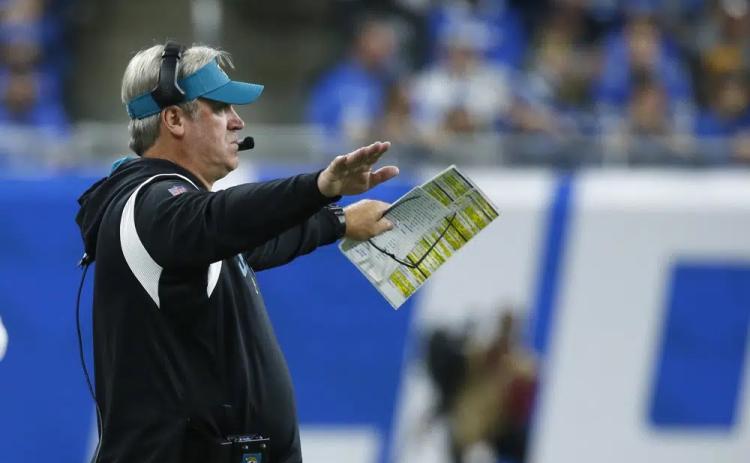 Jacksonville Jaguars head coach Doug Pederson signals from the sideline during Sunday’s against the Detroit Lions in Detroit. (DUANE BURLESON/Associated Press)