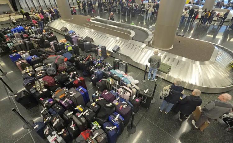 Baggage waits to be claimed at the Southwest Airlines baggage claim Tuesday at Salt Lake City International Airport. (RICK BOWMER/Associated Press)
