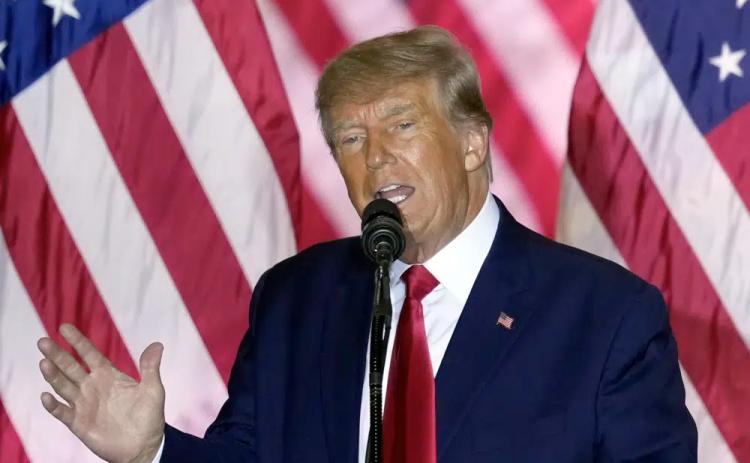 Former President Donald Trump announces a third run for president as he speaks at Mar-a-Lago in Palm Beach on Nov. 15. As a businessman and president, Trump faced a litany of lawsuits and criminal investigations yet emerged from the legal scrutiny time and again with his public and political standing largely intact. (REBECCA BLACKWELL/AP File)
