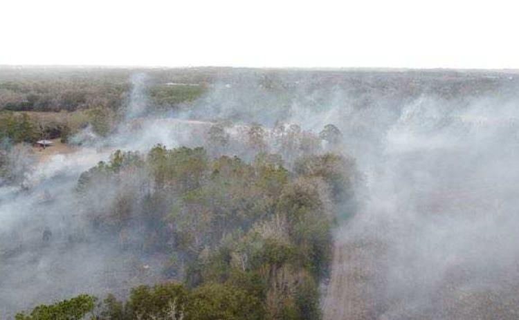 A brush fire spread across 44 acres southeast of Lake City on Thursday afternoon before it was contained. (COURTESY)