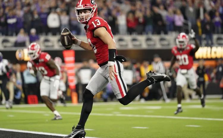 Georgia quarterback Stetson Bennett runs into the end zone for a touchdown against TCU the national championship on Monday in Inglewood, Calif. (ASHLEY LANDIS/Associated Press)