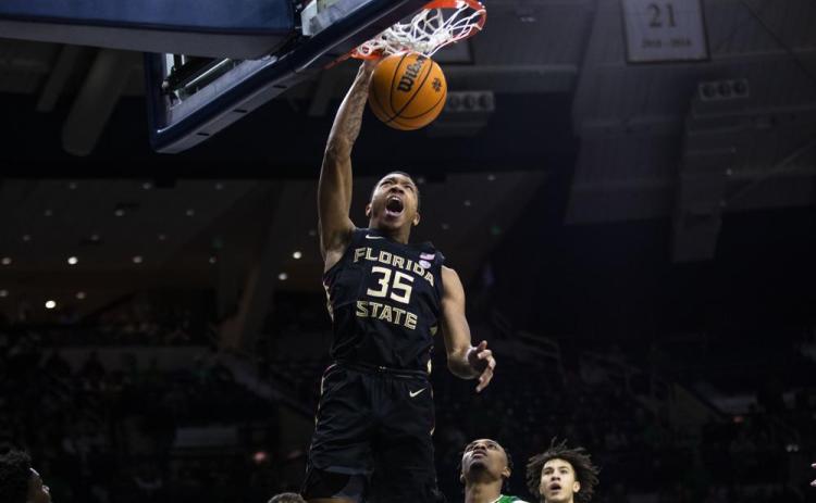 Florida State's Matthew Cleveland dunks against Notre Dame on Tuesday in South Bend, Ind. (MICHAEL CATERINA/Associated Press)