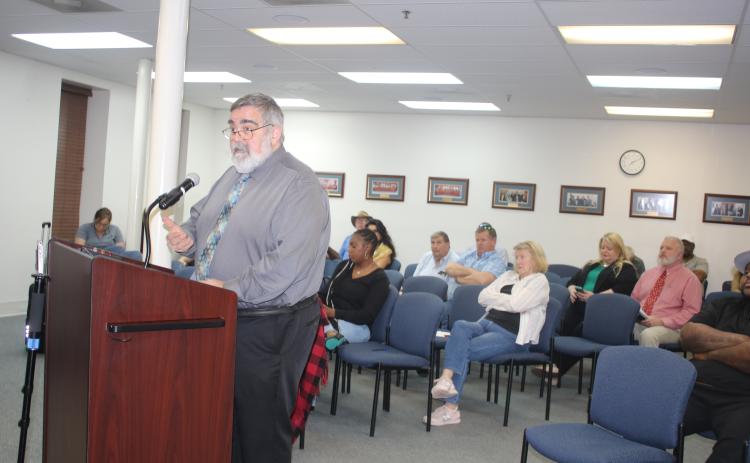 Columbia County Manager David Kraus answers questions about the county’s interest in Richardson Community Center at Tuesday’s meeting. (TONY BRITT/Lake City Reporter)