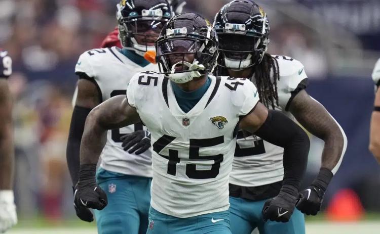 Jacksonville Jaguars linebacker K'Lavon Chaisson celebrates a play against the Houston Texans during Sunday's game in Houston. (ERIC CHRISTIAN SMITH/Associated Press)