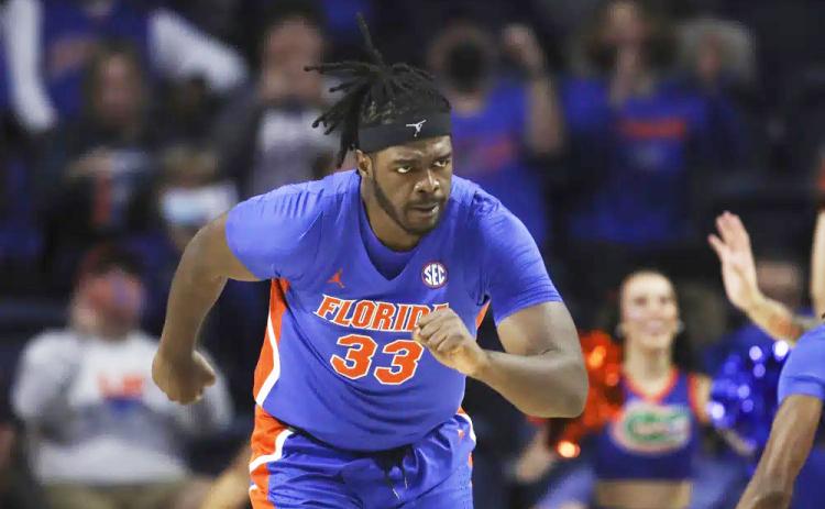 Florida center Jason Jitoboh runs up court after making a shot against Alabama on Jan. 5, 2022, in Gainesville. (MATT STAMEY/Associated Press)