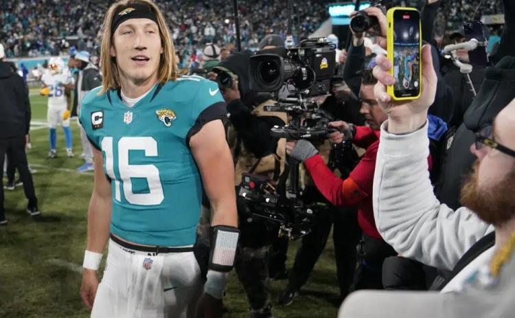 Jacksonville Jaguars quarterback Trevor Lawrence walks off the field after last Saturday's wild-card playoff game against the Los Angeles Chargers in Jacksonville. The Jaguars won 31-30. (CHRIS CARLSON/Associated Press)