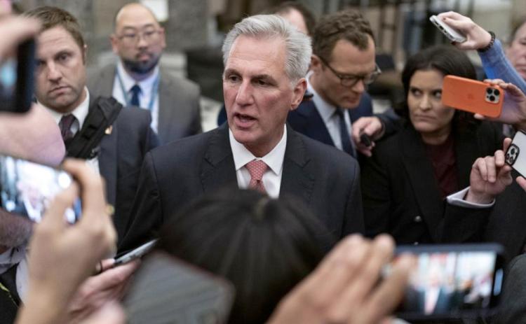 Rep. Kevin McCarthy, R-Calif., talks to reporters as he leaves the House floor after the House voted to adjourn for the evening as the House met for a third day to try and elect a speaker on Capitol Hill on Thursday. (JOSE LUIS MAGANA/Associated Press)
