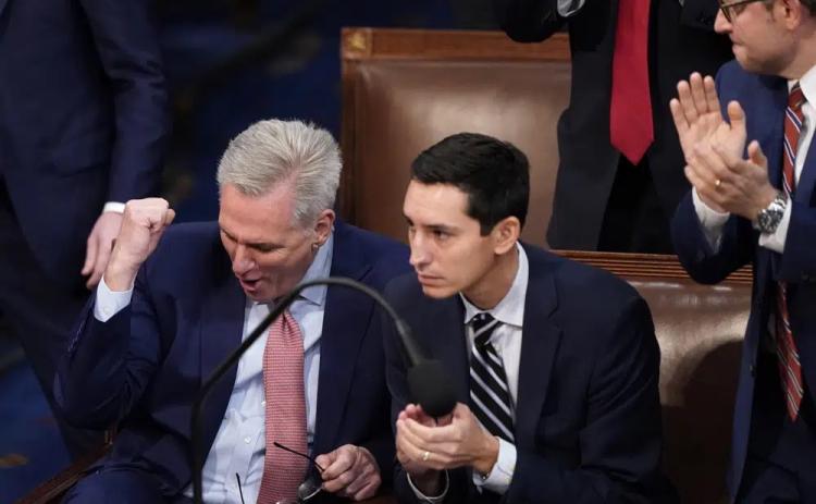 Rep. Kevin McCarthy (left) reacts after being nominated for the third round of votes for Speaker of the House on the opening day of the 118th Congress at the U.S. Capitol on Tuesday in Washington. (ALEX BRANDON/Associated Press)