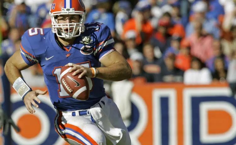 Florida quarterback Tim Tebow scrambles against Florida Atlantic on Nov. 17, 2007, in Gainesville. (AP FILE)