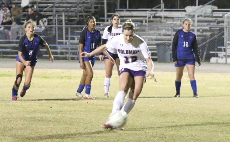 Columbia’s Skyler Ziegaus strikes the ball on her penalty kick in the first half of Friday’s District 2-5A semifinal at Clay. (MORGAN MCMULLEN/Lake City Reporter)