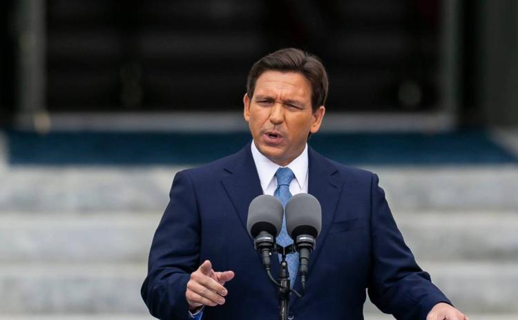 Florida Gov. Ron DeSantis, giving a speech during his inauguration ceremony in January, proposed a record $115 billion budget on Wednesday. (MATIAS J. OCNER/Miami Herald/TNS)