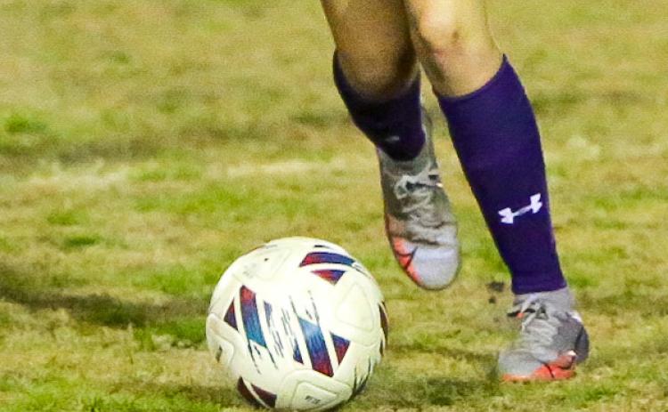 A Columbia soccer player dribbles the ball during a match this past season. (BRENT KUYKENDALL/Lake City Reporter)
