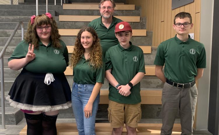 The Florida Gateway College Brain Bowl team is competing in the National Academic Quiz Tournaments Community College Championship Tournament in Chicago this weekend. Team members are Keilley Sweat (from left), Angelina Troshyna, Coach James Givvines, Hunter Neeley and Avery Murphy. Not pictured is Lindsay Wheeles. (COURTESY)