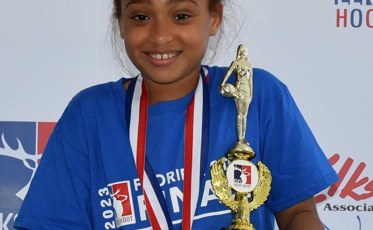 Lilianna Holman won the 8-9 age division at the Florida Elks Association Hoop Shoot state finals. (COURTESY)