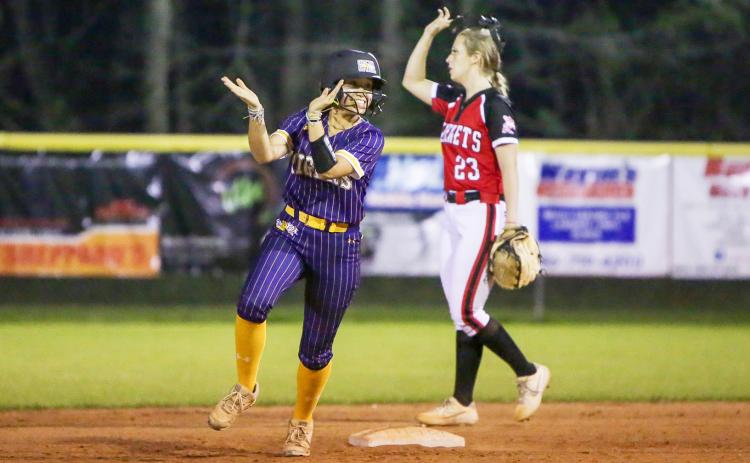 Columbia outfielder Luisa Taylor celebrates coming off second base after McKenna O’Sullivan hit a home run against Lafayette on Tuesday night. (BRENT KUYKENDALL/Lake City Reporter)