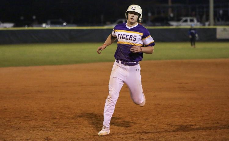 Columbia’s Josh Fernald runs to third base against Bartram Trail on Feb. 22. (BRENT KUYKENDALL/Lake City Reporter)