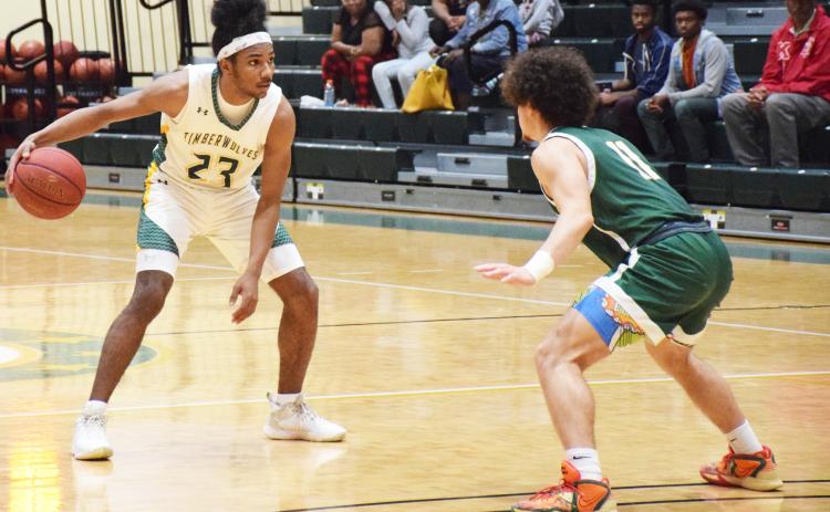 FGC guard Amayoaah Phillips initiates the action against Palm Beach State on Feb. 15. (COURTESY OF FGC)