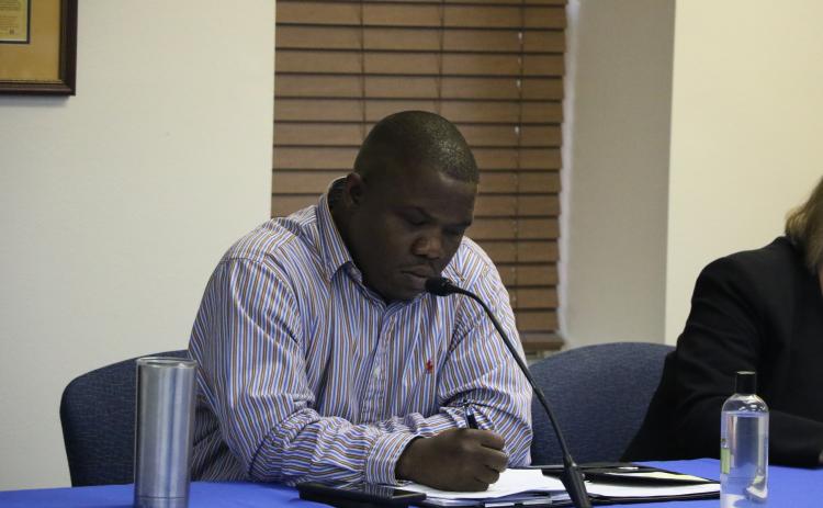 Assistant City Manager Demetrious Johnson takes notes during a Lake City Council meeting in August 2022. (MORGAN MCMULLEN/Lake City Reporter)