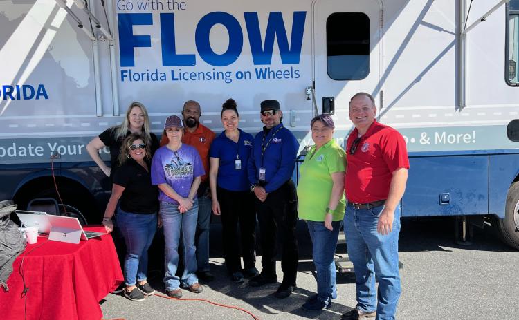 Columbia County Tax Collector Kyle Keen (right) and staff were working the Florida Licensing on Wheels mobile clinic at Saturday’s driver’s license reinstatement event. (COURTESY)