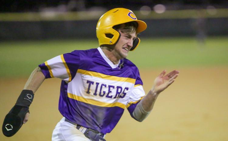 Columbia’s Matt Dumas strains as he rounds third base during Wednesday’s 8-5 loss to Chiles. (BRENT KUYKENDALL/Special to the Reporter)