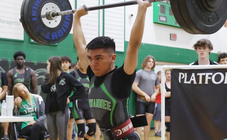 Suwannee’s Chris Gonzalez performs the clean and jerk during the Region 2-1A meet on Friday. Gonzalez won regional titles in the traditional and Olympic in the 119 weight class to qualify for state in both events. (PAUL BUCHANAN/Special to the Reporter)