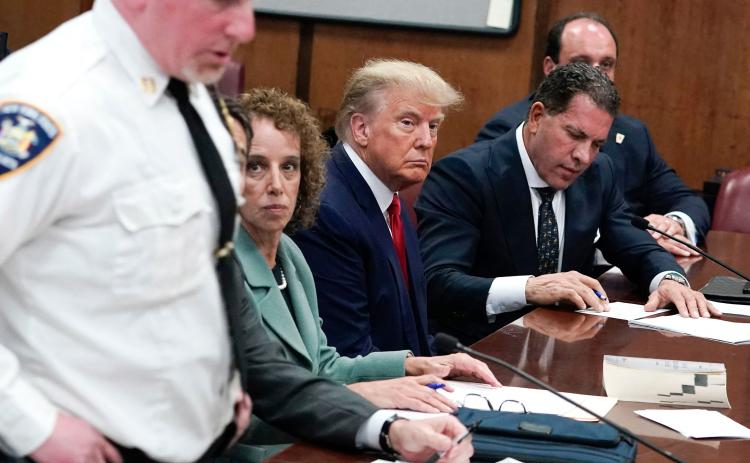 Former U.S. president Donald Trump appears in court at the Manhattan Criminal Court in New York on Tuesday. (SETH WENIG/Getty Images/TNS)