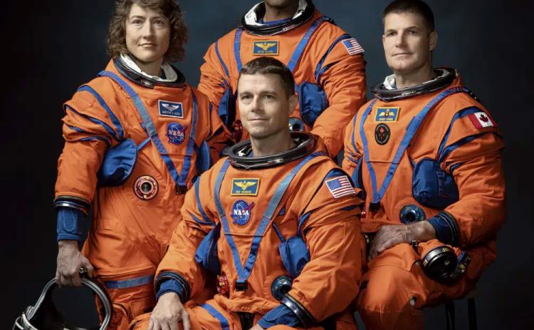This photo provided by NASA shows, from left, NASA Astronauts Christina Koch, Victor Glover, Reid Wiseman, and Canadian Space Agency Astronaut Jeremy Hansen at the Johnson Space Center in Houston on March 29, 2023. (JOSH VALCARCEL/NASA via AP)