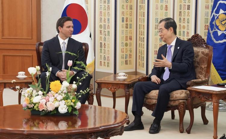 Florida Gov. Ron DeSantis talks with South Korean Prime Minister Han Duck-soo on Wednesday as part of a four-nation trade mission trip. (COURTESY Office of the Governor)
