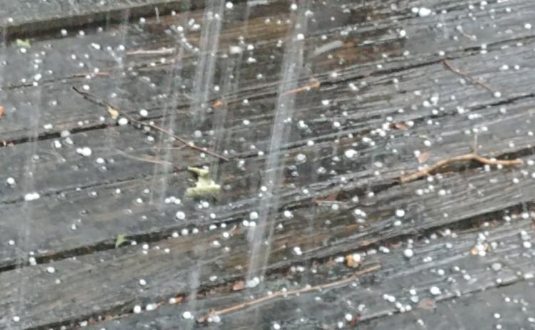 A thunderstorm Thursday afternoon brought pea- to nickel-sized hail to parts of Lake City. (TONY BRITT/Lake City Reporter)