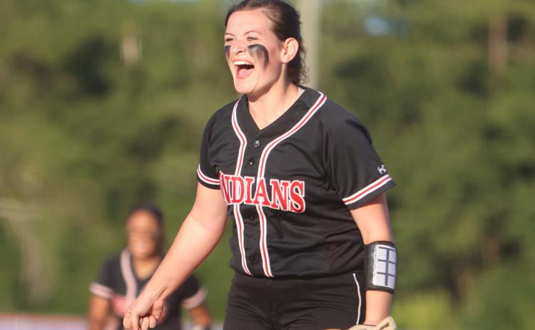 Fort White pitcher Kadence Compton celebrates after a strikeout against Union County in the District 6-1A semifinals on Tuesday night. (PAUL BUCHANAN/Special to the Reporter)