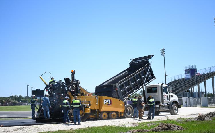 Crews from C.A. Boone Construction and Bubba’s Site Prep work on Columbia High’s track at Tiger Stadium. (COURTESY)