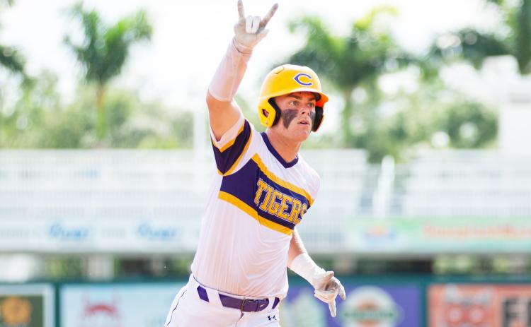Columbia catcher Hayden Gustavson celebrates heading toward third base after hitting a home run against American Heritage in the Class 5A state semifinals on Monday at Hammond Stadium in Fort Myers. (JESSICA PILAND/Special to the Reporter)