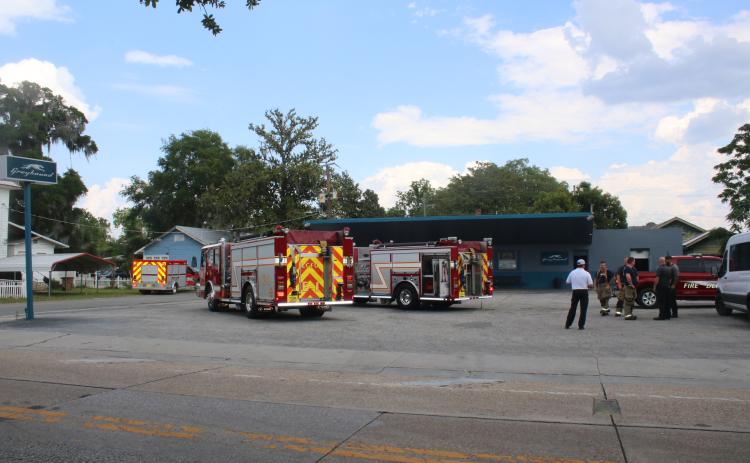 Lake City Fire Department trucks respond to a fire at the Greyhound bus station on Wednesday afternoon. (TONY BRITT/Lake City Reporter)