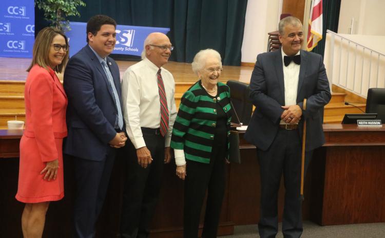 Former Melrose Elementary and Columbia City Elementary teacher Imogene Miller (second from right) shares a laugh with CCS Board members Cherie Hill (from left), Hunter Peeler, Keith Hudson and Superintendent Lex Carswell during Tuesday evening’s ceremony honoring five ‘Teachers of a Lifetime.’ (MORGAN MCMULLEN/Lake City Reporter)