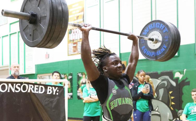 Suwannee’s Marquavious Owens completes the clean and jerk during the District 5-1A meet on March 31. (PAUL BUCHANAN/Special to the Reporter)