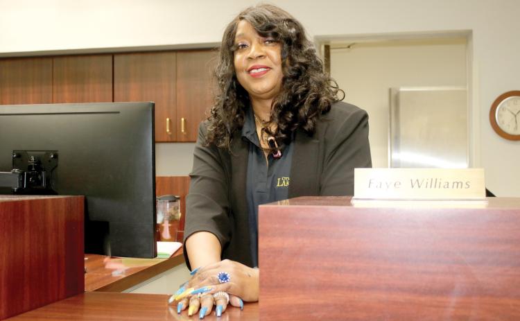 Faye Williams, a customer representative with the City of Lake City, is retiring after 44 years working with the city. (TONY BRITT/Lake City Reporter)